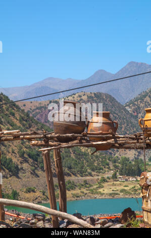 Panorama of mountain with clay pots in the foreground. Stock Photo