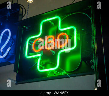 An illuminated sign in the window of a store in New York advertises the sale of CBD products, seen  on Friday, August 16, 2019. CBD is the non-psychoactive component of marijuana as opposed to tetrahydrocannabinol (THC) which is the stuff that gets you high, not to mention being illegal at this time. (© Richard B. Levine) Stock Photo