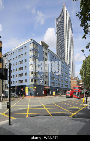 Julian Markham House, Unite Students housing block on Walworth Road, London, UK, near Elephant and Castle. Strata Tower in background. Stock Photo