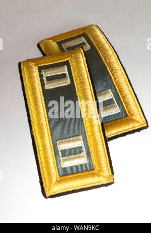 US Army Infantry Captain Shoulder Board for a Dress Blue Uniform and rank  insignias, USA Stock Photo - Alamy