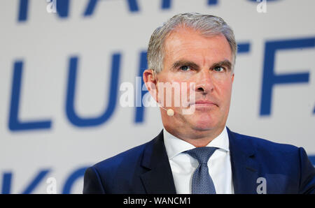 Schkeuditz, Germany. 21st Aug, 2019. Carsten Spohr, Chairman of the Executive Board of Deutsche Lufthansa AG, is on the podium at the first National Aviation Conference at Leipzig-Halle Airport. Credit: Jan Woitas/dpa-Zentralbild/dpa/Alamy Live News Stock Photo