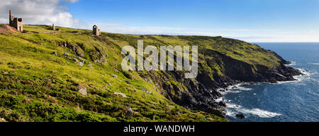 West Wheal Owles Cargodna Mine tine mine at Botallack with seaside cliffs on the Celtic Sea Cornwall England Stock Photo