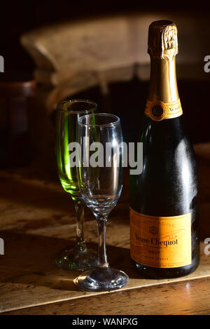 A bottle of Veuve Cliquot fine champagne and two glasses made in Reims France Stock Photo