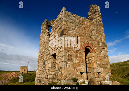 Wheal Edward engine house with West Wheal Owles ruins and moon at Botallack Cornwall England Stock Photo