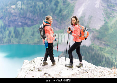 Two strong hikers are happy about awesome view and hike in Montana Stock Photo