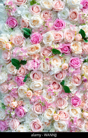 Artificial silk roses pattern Stock Photo