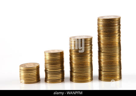 Four rows of stack of golden coins Stock Photo