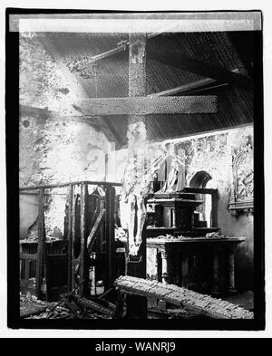 Crucifix in burned church interior], 10/26/22 Stock Photo