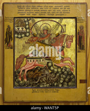 Archangel Michael the Archistrategos (Voyevoda) with selected saints. Nevyansk icon dated from the first half of the 18th century on display in the Nevyansk Icon Museum (Nevyanskaya Ikona) in Yekaterinburg, Russia. Stock Photo