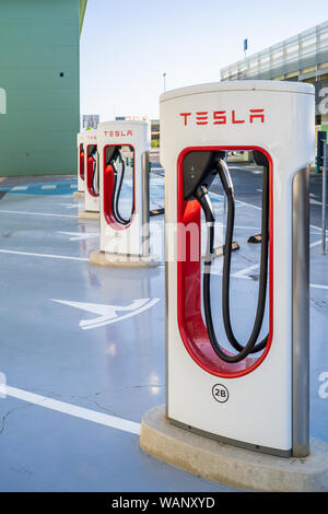 Oslo, Norway - August 20, 2019: Tesla Supercharger station with 10 charging stations. Supercharger stations allow Tesla cars to be fast-charged at the Stock Photo