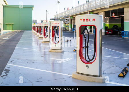 Oslo, Norway - August 20, 2019: Tesla Supercharger station with 10 charging stations. Supercharger stations allow Tesla cars to be fast-charged at the Stock Photo