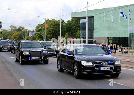 Helsinki, Finland. August 21, 2019. The presidential motorcade of Russian President Vladimir Putin passes along Mannerheimintie en route to official meeting with Finnish President Sauli Niinistö at the Presidential Palace. President Niinistö and President Putin will hold official discussions in the Presidential Palace, concluded by a dinner at the Suomenlinna Sea Fortress. Credit: Taina Sohlman/Alamy Live News Stock Photo