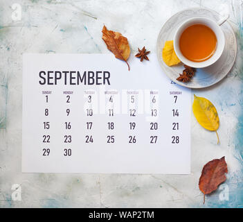 Simple 2019 September monthly calendar on table with office supplies Stock Photo