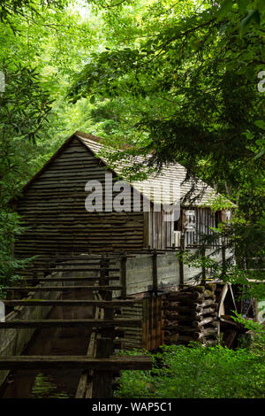 Water wheel and old mill in the woods.  Cades Cove, Smoky Mountains National Park, Tennessee Stock Photo