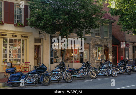 Frederick, Maryland, USA - May 23, 2018: Harley-Davidson motorcycles parked on a street in Frederick, Maryland