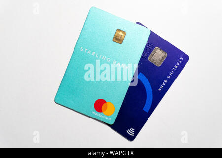 Credit cards emitted by the new digital bank Starling Bank on white background Stock Photo