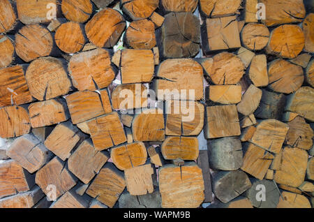 Background, texture of the wall from the folded logs. Stock Photo