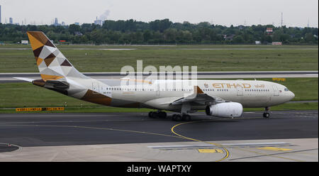 DUSSELDORF, GERMANY - MAY 26, 2019: Etihad Airways Airbus A330-243 (CN 729) taxi in Dusseldorf Airport.