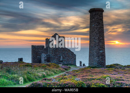 Wheal Coates, near St. Agnes in North Cornwall, England. Monday 21st August 2019. UK Weather. Like a scene from Poldark, after a warm summers day, the temperature drops as the sun sets over Wheal Coates near St. Agnes Beacon in North Cornwall. Credit: Terry Mathews/Alamy Live News