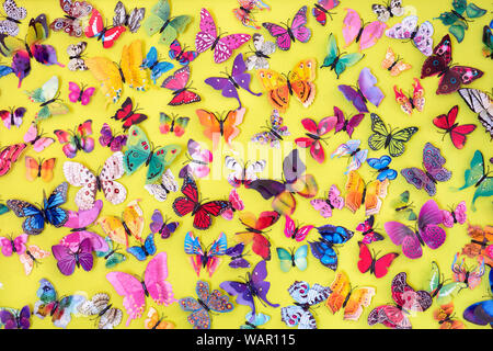 Butterfly pattern with textile texture for backdrops, background, diary and notebook and book covers. Element of decoration. Decorative butterflies background. LIghtness and freedom concept Stock Photo
