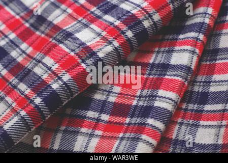 Red, blue and white tartan pattern cloth. Texture detail close up. Stock Photo