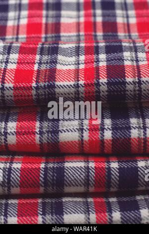 Red, blue and white tartan pattern cloth. Texture detail close up. Stock Photo