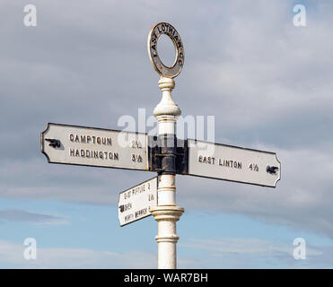 A charming sign post in the village of Athelstaneford, East Lothian, Scotland, UK.
