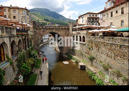 Madrid, Spain. 20th Aug, 2019. Tourists visit the village of Potes at the foot of Picos de Europa, Spain, Aug. 20, 2019. Credit: Guo Qiuda/Xinhua/Alamy Live News Stock Photo