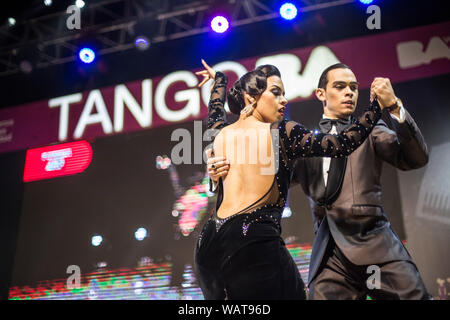 Buenos Aires, Argentina. 21st Aug, 2019. A couple performs at the stage tango at the Tango World Championship. Credit: Nicolas Villalobos/dpa/Alamy Live News Stock Photo