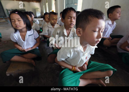 Burmese children in a monastic school in Mandalay, Myanmar (Burma) Stock Photo
