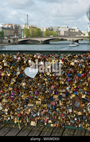 Padlocks of love on Pont de Artes bridge across the Seine River. Paris, France. Stock Photo