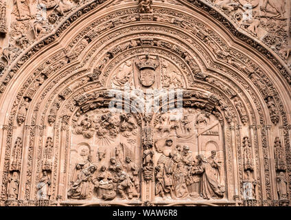 Salamanca, España - August 18, 2019: Detail of the main cover of the cathedral called the 'portada de ramos', sculptural group of the Entrance of Jesu Stock Photo