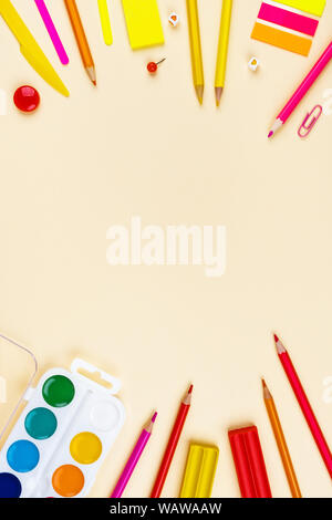 Back to school creative template with pencils, plasticine and watercolor. Composition in red and yellow tones. Stock Photo