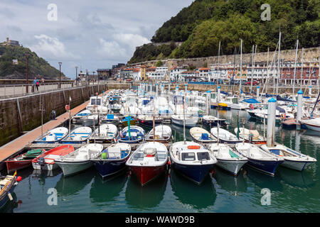 Leisure boats and fishing boats in the port, San Sebastian, Gipuzkoa Province, Basque Country, Spain. Stock Photo