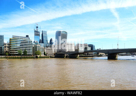 Panorama of London under the blue sky white white clouds and river Thames in front Stock Photo