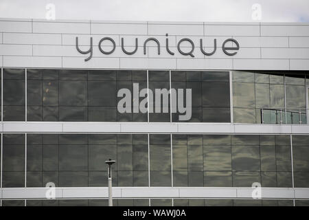 A logo sign outside of the headquarters of Younique in Lehi, Utah on July 27, 2019. Stock Photo