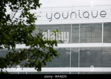 A logo sign outside of the headquarters of Younique in Lehi, Utah on July 27, 2019. Stock Photo