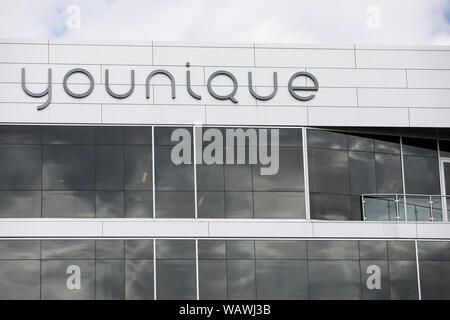 A logo sign outside of the headquarters of Younique in Lehi, Utah on July 27, 2019. Stock Photo