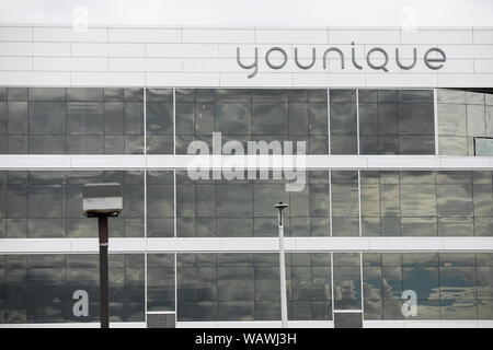 A logo sign outside of the headquarters of Younique in Lehi, Utah on July 27, 2019. Stock Photo