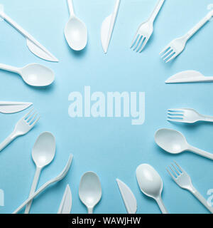 Bulk packing of plastic cutlery, disposable cutlery, knives, forks, spoons,  plastic garbage, various colours, types Stock Photo - Alamy