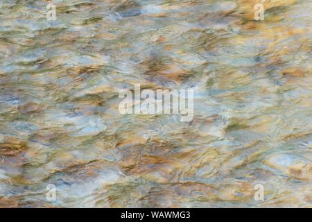 Water and waves in the mountain stream Soca, near Bovec, Slovenia Stock Photo