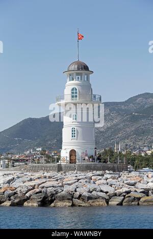 Lighthouse in the harbour entrance, Alanya, province Antalya, Turkey Stock Photo