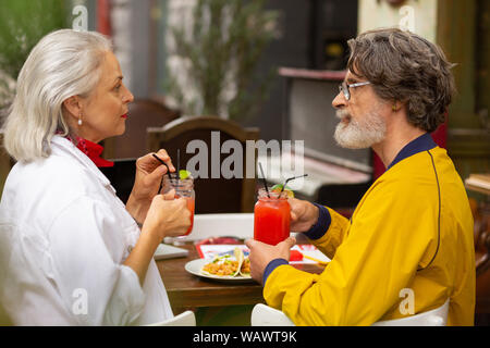 Married couple in the middle of tough talk. Stock Photo