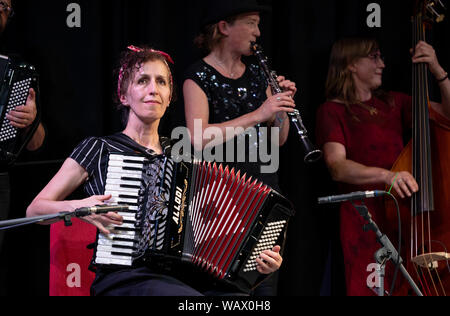 Musicians with the London Klezmer Quartet playing klezmer music during a faculty concert at the Klezfest music festival in London, August 2019. Stock Photo