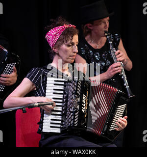 Carol Isaacs of the London Klezmer Quartet playing klezmer music on the accordion during a concert at the Klezfest music festival in London, Aug 2019. Stock Photo