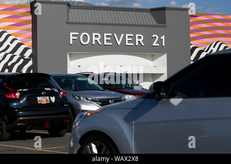 A logo sign outside of a Forever 21 retail store in Sandy, Utah on July 27, 2019. Stock Photo