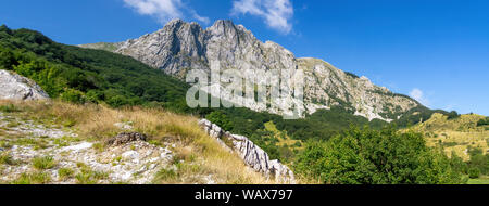 Beautiful panorama of Campocatino landscape view with Mount Roccandagia, Apuan Alps, behind. In summer, Lucca province, Tuscany, Italy. Stock Photo
