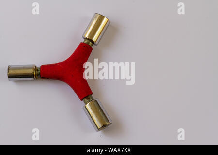 looking down on an old well used three way hex tool Stock Photo