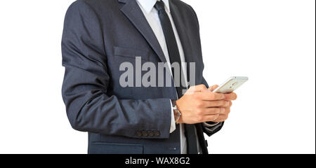 Man using mobile smart phone isolated cutout, against white background, close up view. Young businessman in blue gray suit Stock Photo