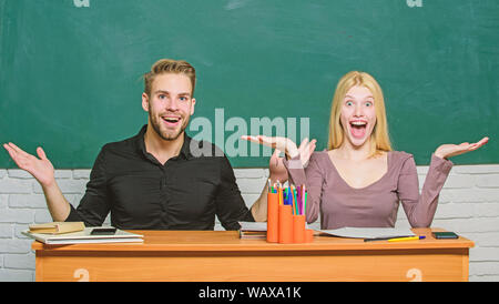 Relations with classmates. Students communicate classroom chalkboard background. Education concept. Communication between group mates. Friendship and relations. Compromise solution. College relations. Stock Photo